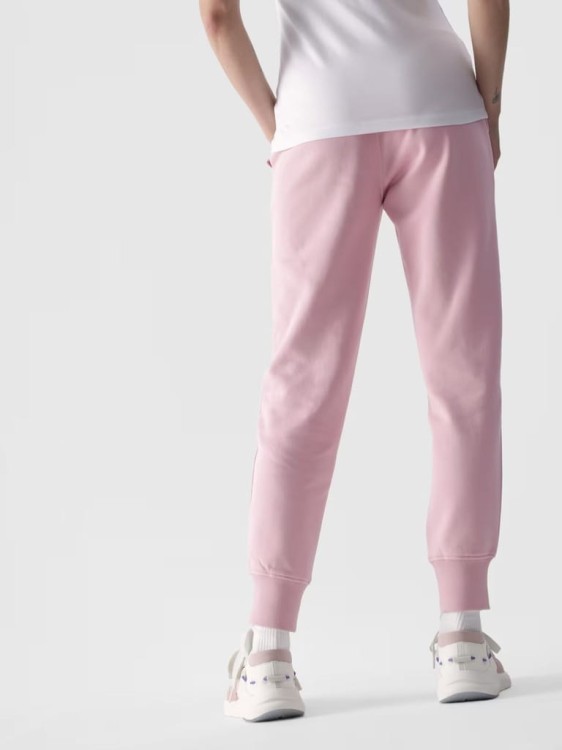 Damskie spodnie dresowe 4F TROF0946 różowe 56S XXL