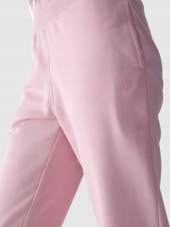 Damskie spodnie dresowe 4F TROF0946 różowe 56S XXL